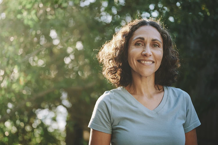 Woman confidently managing her finances on her own